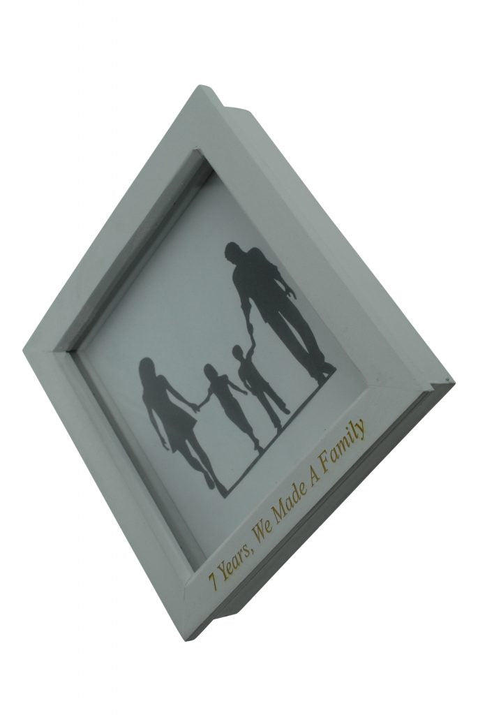 7 Years We Made A Family White Wooden Frame
